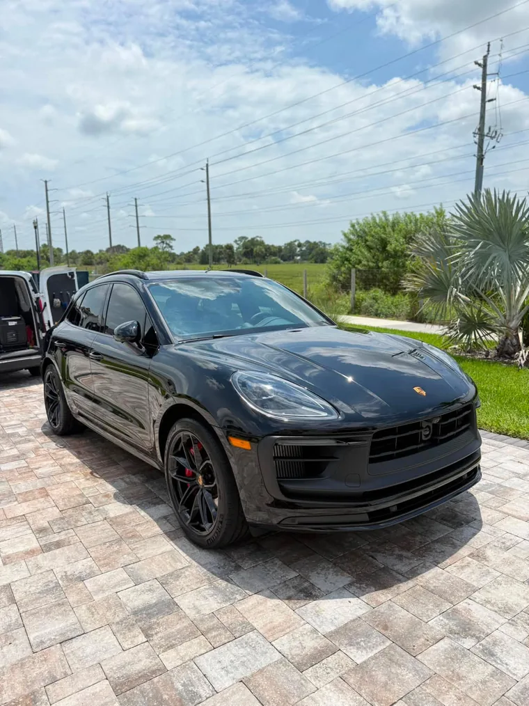 Deep gloss on a black Porsche Macan GTS after paint work by A2D.